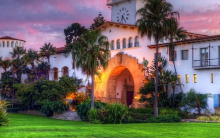 a photo of the courthouse at sunset, it is just one of the many historic landmarks that you will find in Santa Barbara!